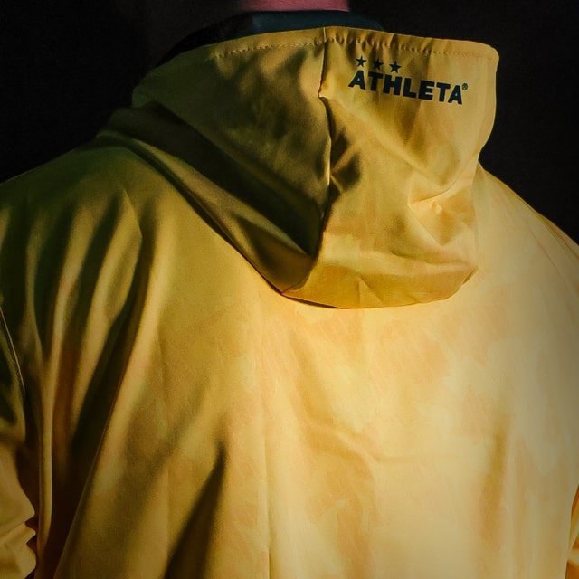 Athleta Free 超細纖維男女通用風衣 黃色