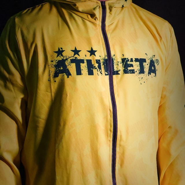 Athleta Free 超細纖維男女通用風衣 黃色